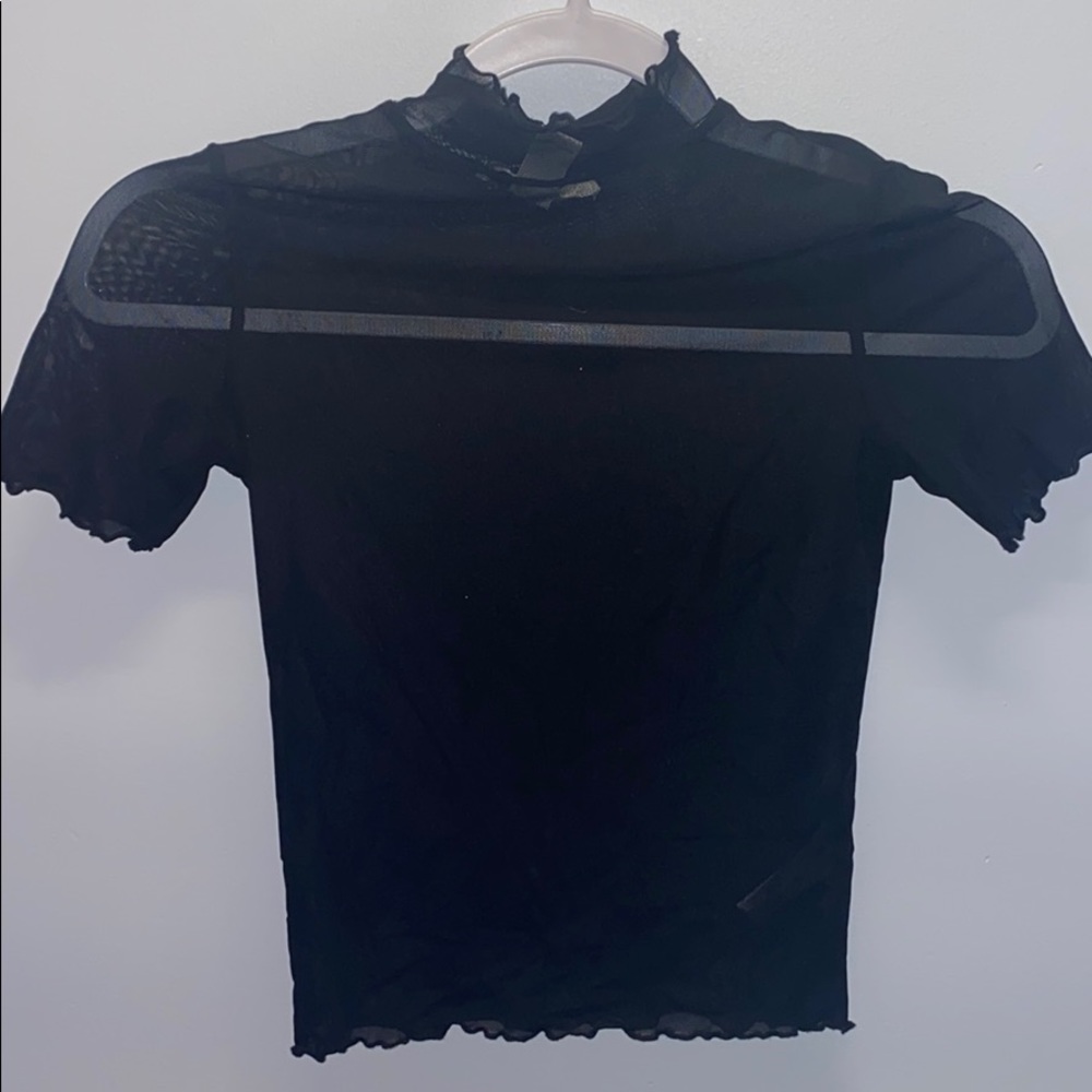 Sheer black ruffled shirt